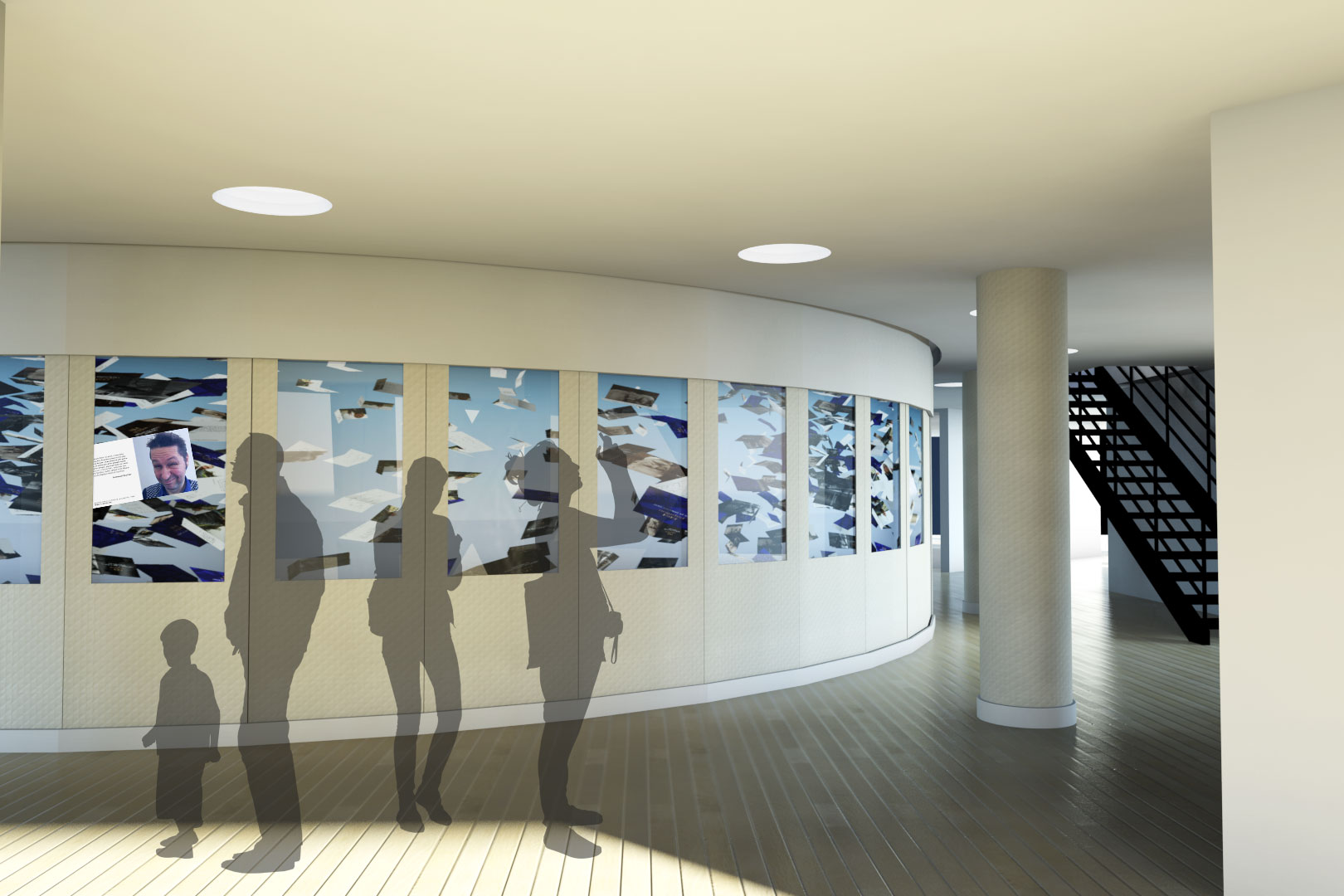 L'image montre un intérieur moderne avec des murs courbes. À gauche, il y a un mur avec une exposition d'œuvres artistiques ou de photos, tandis qu'à droite, un escalier mène à un étage supérieur. On peut voir des silhouettes de personnes qui se tiennent près du mur, dont une silhouette de petit enfant. L'éclairage est naturel grâce à des fenêtres ou des puits de lumière. Le sol est en bois, ajoutant une touche chaleureuse à l'espace.